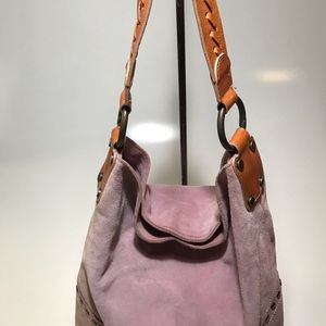 Pink suede bag with brown stitched leather strap
